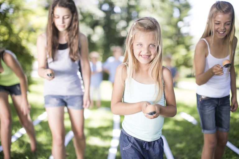 Egg race on the activity field at Walnut Hills Family Campground near Detroit