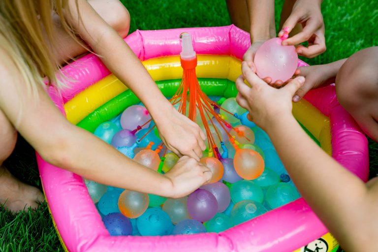 Water balloon fight at Walnut Hills Family Campground near Grand Rapids