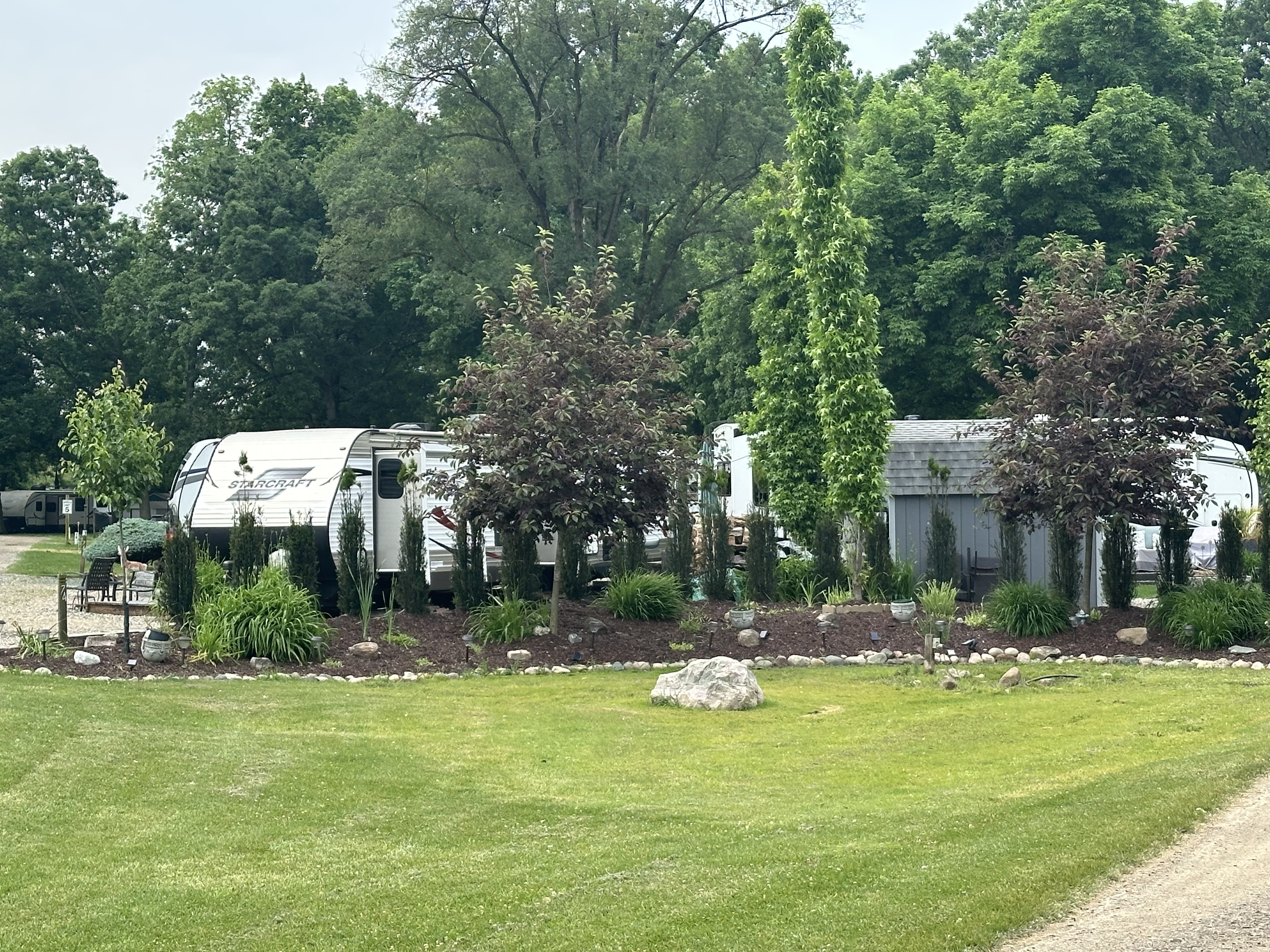 Well manicured seasonal campsites at The Oak Campground