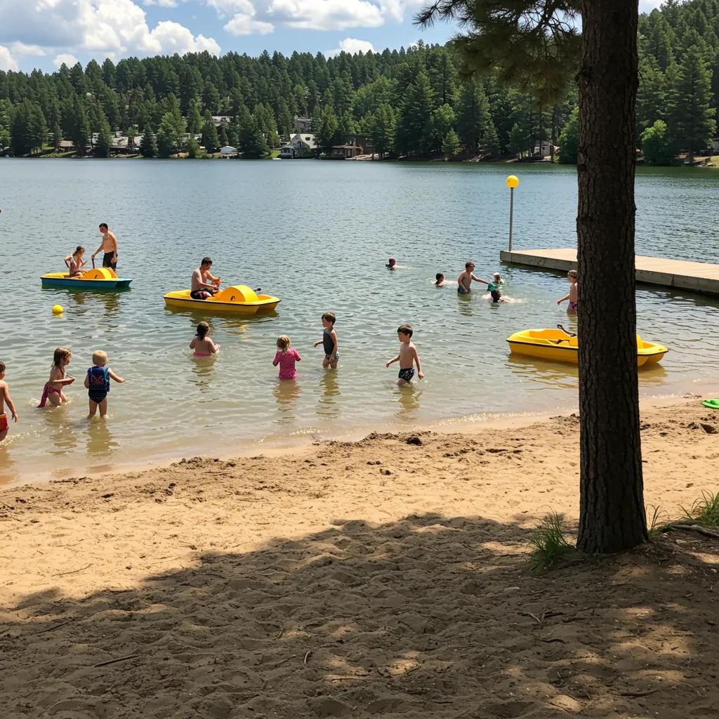 Families enjoying water activities at Ridge Ranch Campground's lakefront