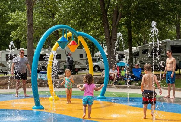 Family enjoying a camping trip at a campground with water features