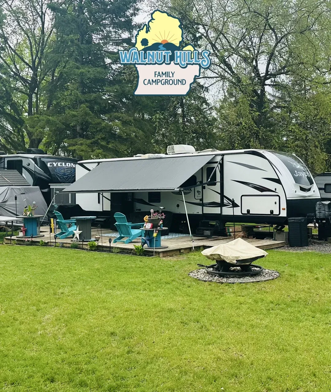 Family enjoying the benefits of a full hook-up RV site with utilities